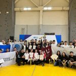 Journal of Humanities & Technology cover, shows books and technology symbols on blue background